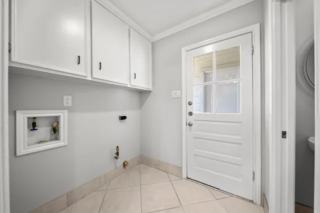 a view of an empty room with cabinet