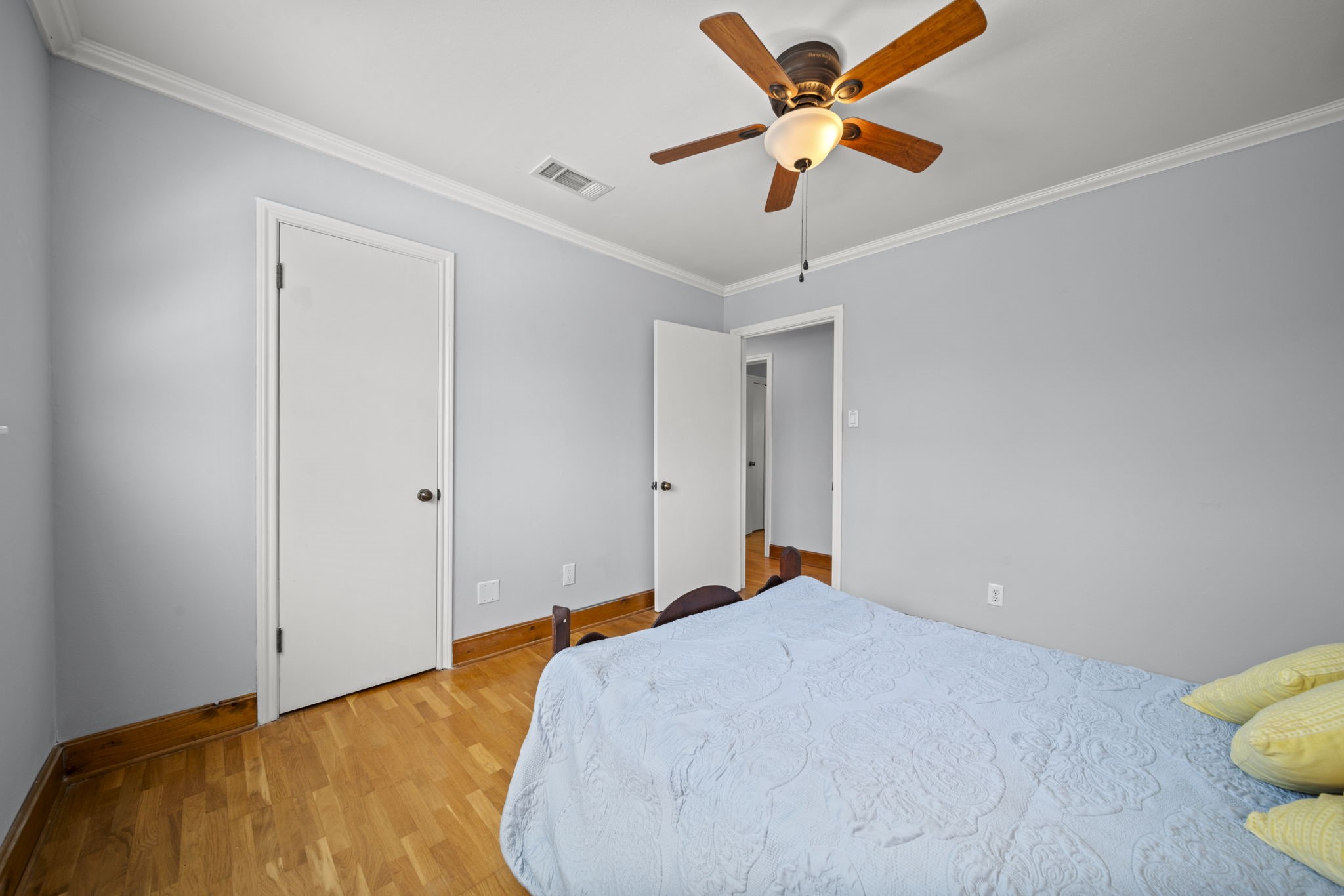 6315 Allentown Drive Spring, TX 77389 - Photo 25 of 46 a bedroom with a bed and a chandelier