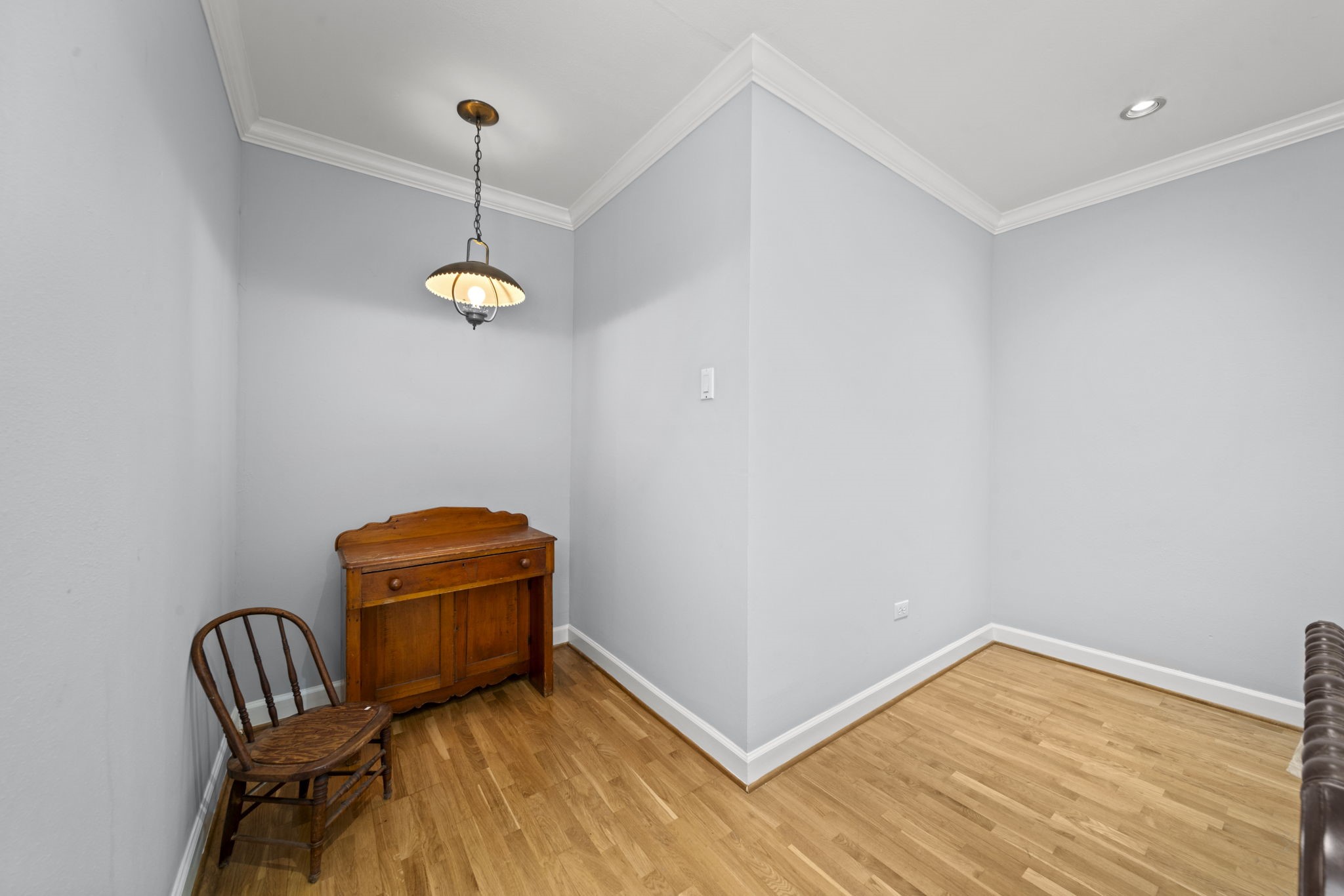 6315 Allentown Drive Spring, TX 77389 - Photo 31 of 46 a view of a room with wooden floor a ceiling fan and a rug