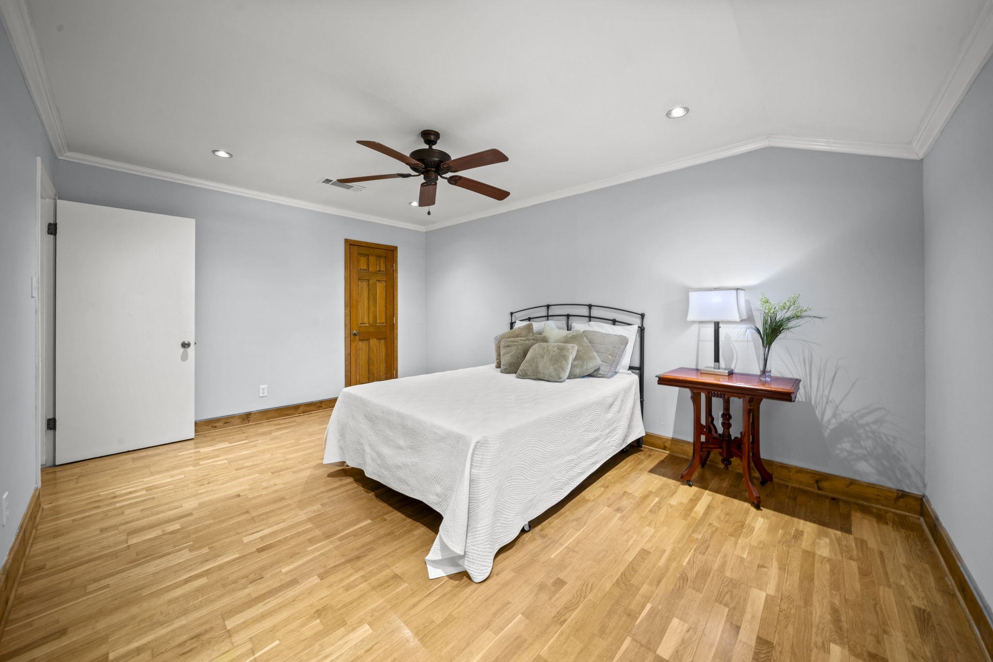 6315 Allentown Drive Spring, TX 77389 - Photo 34 of 46 a bedroom with a bed and a chandelier