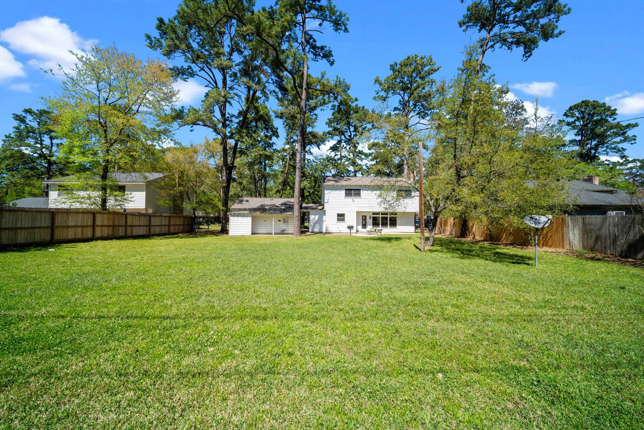 6315 Allentown Drive Spring, TX 77389 - Photo 40 of 46 a view of a yard with a house in the background