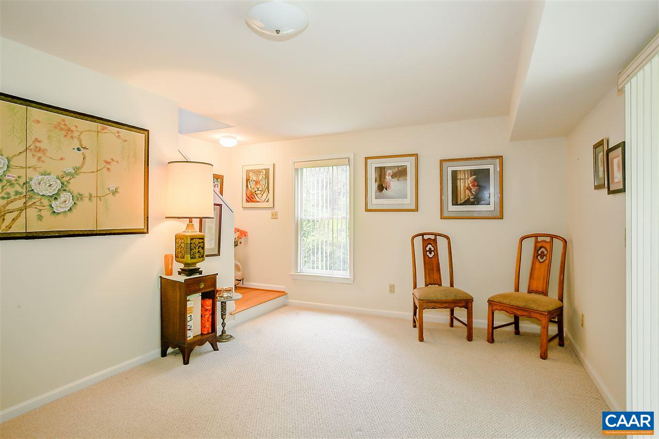 151 Goldenrod Road Ruckersville, VA 22968 - Photo 32 of 33 a view of a livingroom with workspace and a couch