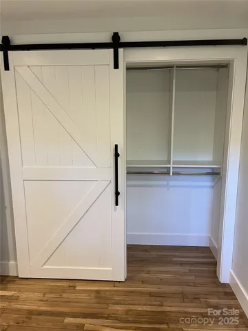 an aerial view of residential house with outdoor space and swimming pool