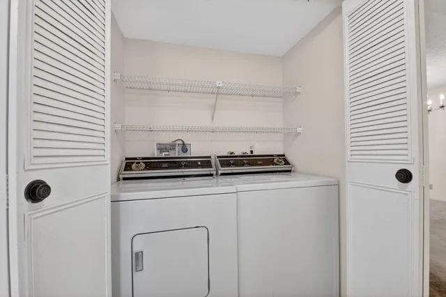 a kitchen with a stove and a refrigerator