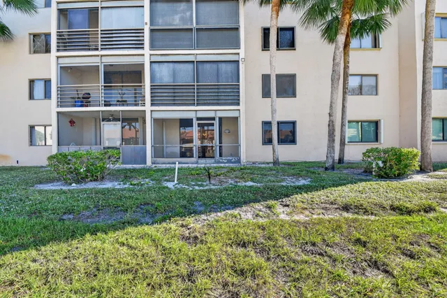 a view of a house with a big yard