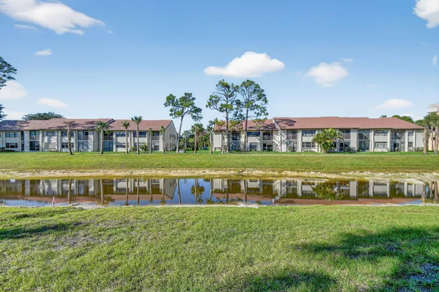 a view of a street with tall buildings