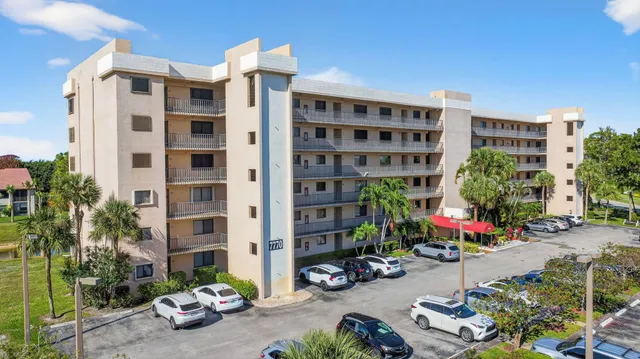 an aerial view of city and lake