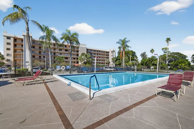 a front view of house with yard and outdoor seating