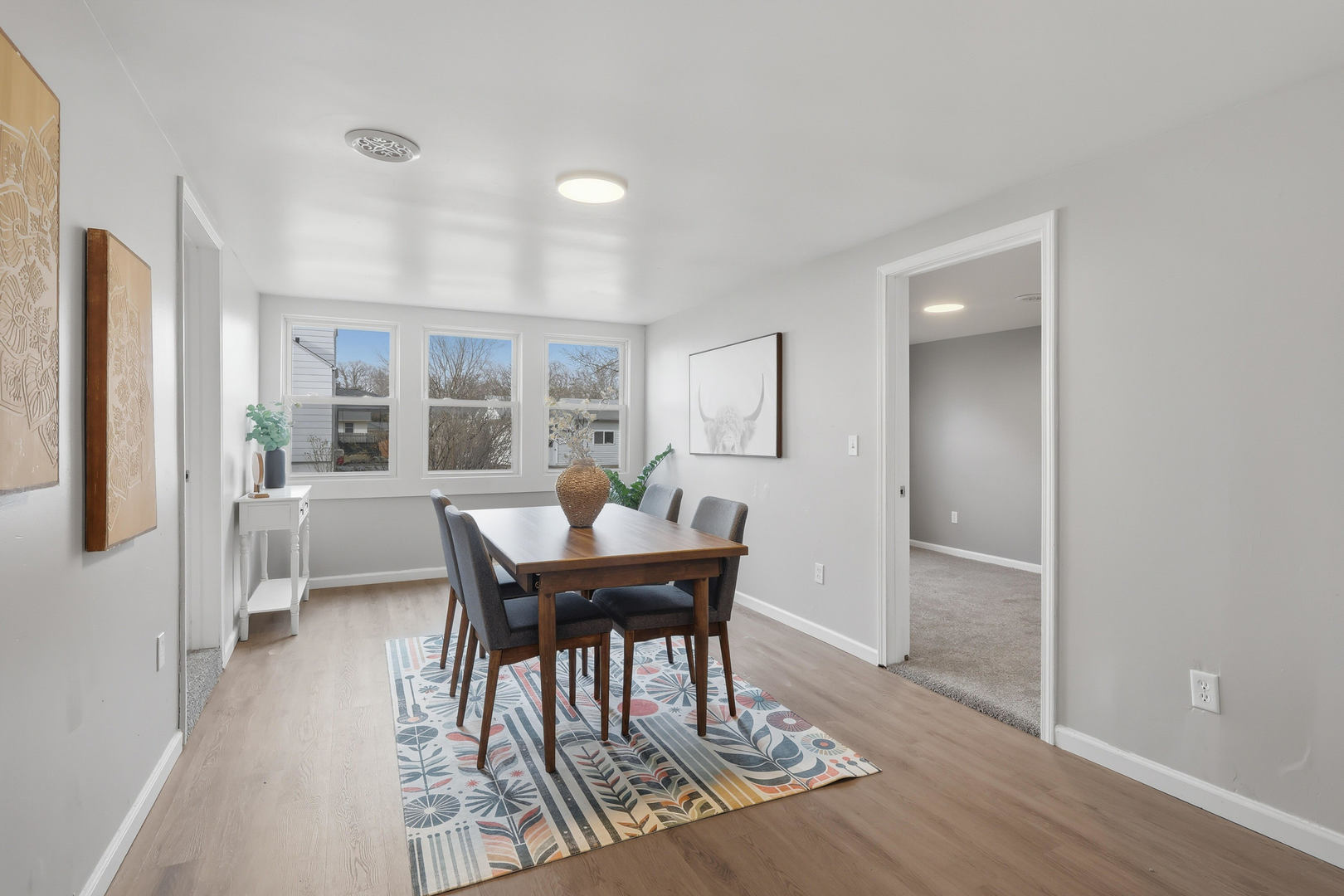 4120 4th Street East Moline, IL 61244 - Photo 13 of 24 a view of a dining room with furniture and wooden floor