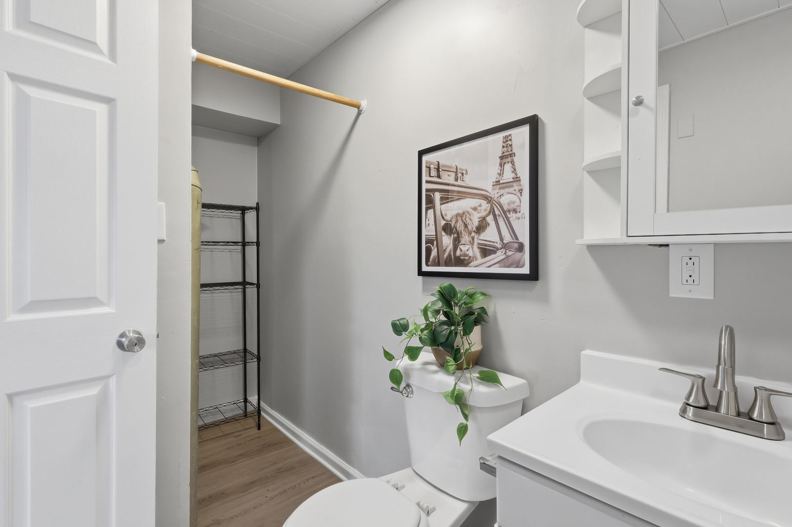 4120 4th Street East Moline, IL 61244 - Photo 17 of 24 a bathroom with a sink mirror and toilet