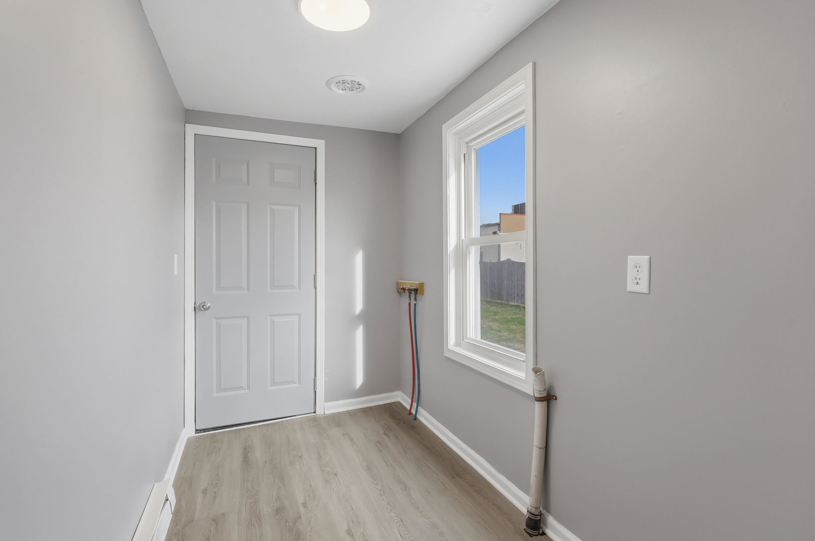 4120 4th Street East Moline, IL 61244 - Photo 21 of 24 a view of an empty room with closet and a window