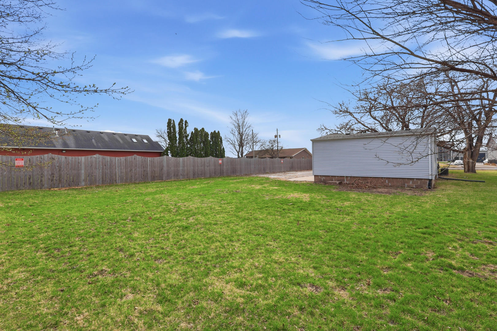 4120 4th Street East Moline, IL 61244 - Photo 22 of 24 front view of a house with a yard