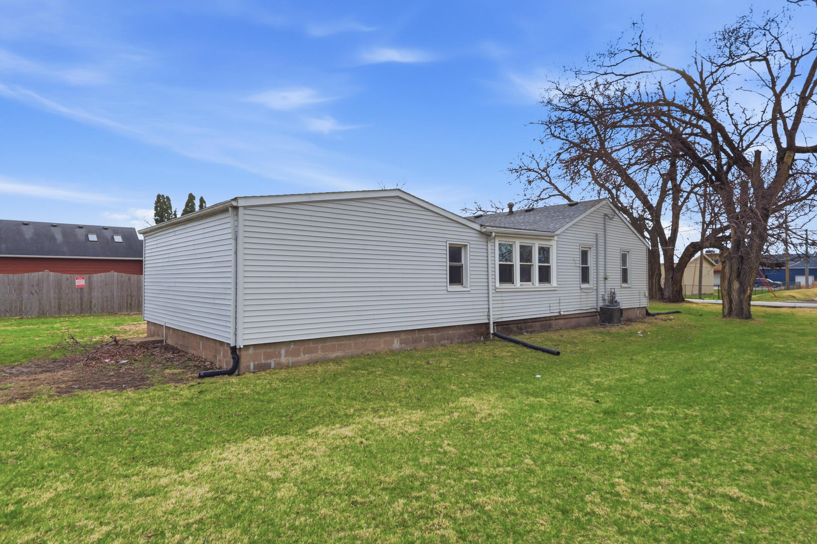 4120 4th Street East Moline, IL 61244 - Photo 23 of 24 a view of a backyard with a garden
