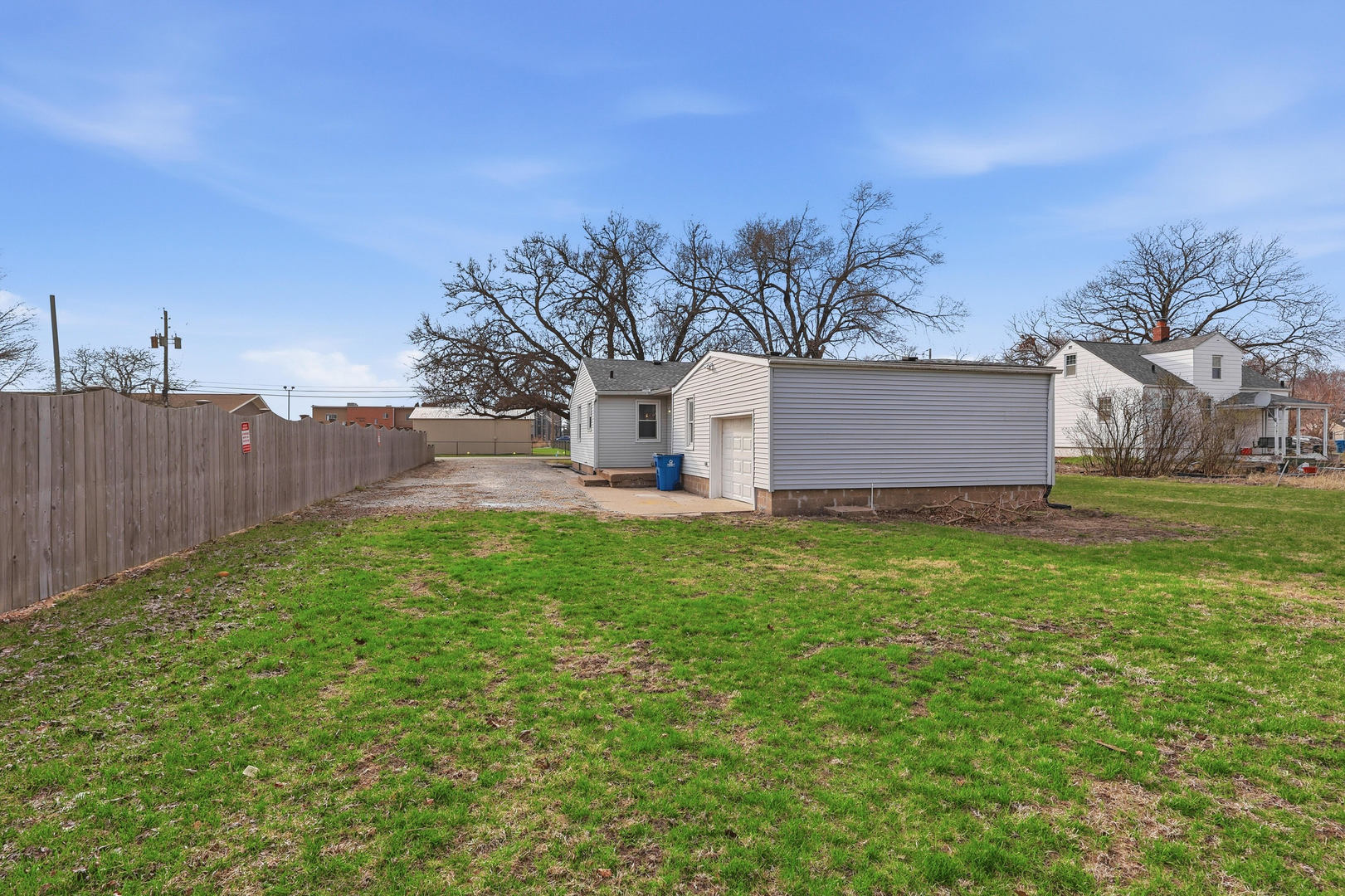 4120 4th Street East Moline, IL 61244 - Photo 24 of 24 a view of a backyard with large trees