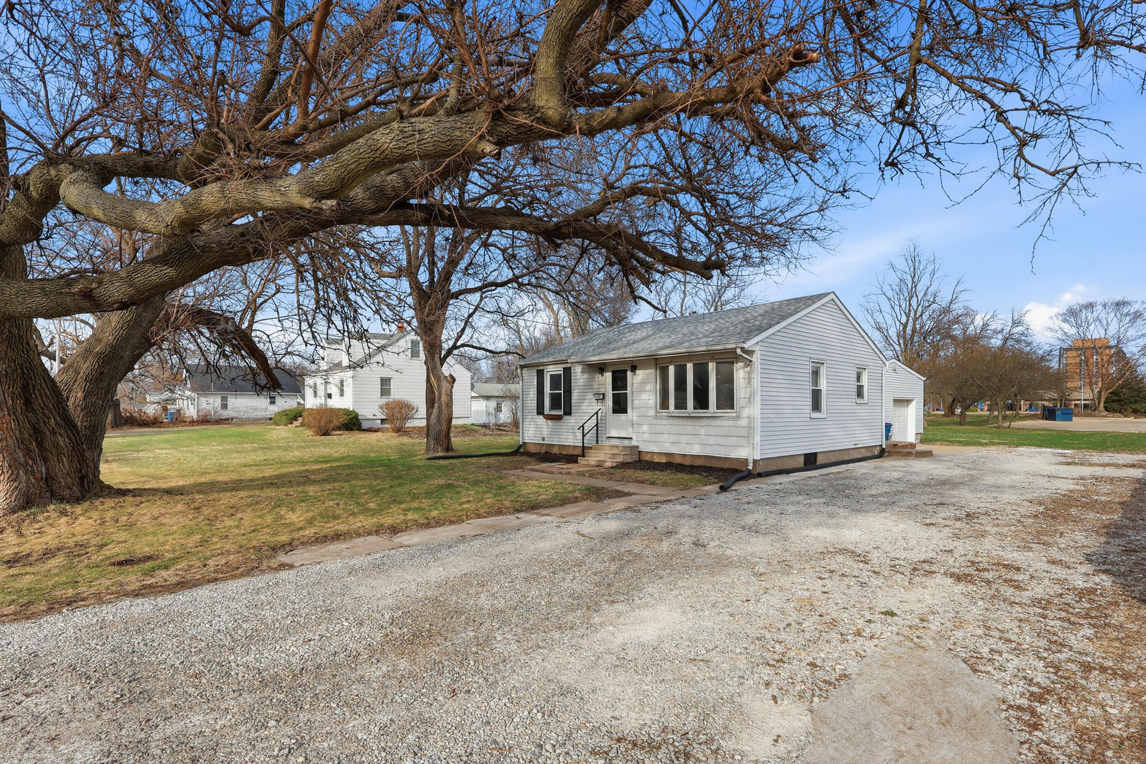 4120 4th Street East Moline, IL 61244 - Photo 3 of 24 a view of a house with a yard