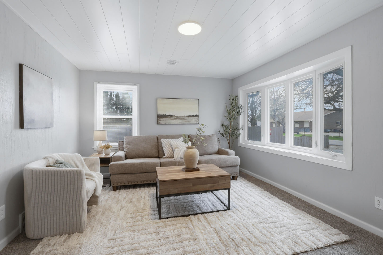 4120 4th Street East Moline, IL 61244 - Photo 5 of 24 a living room with furniture and a window