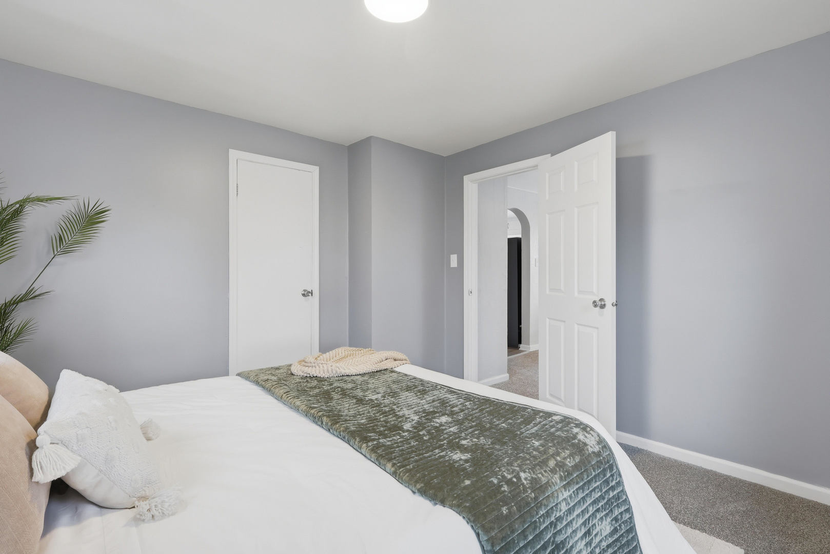 4120 4th Street East Moline, IL 61244 - Photo 9 of 24 a bedroom with a bed and a mirror