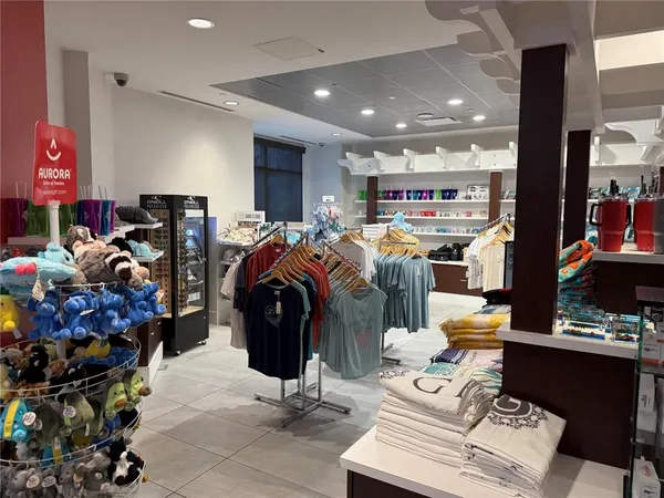 a outdoor living space with furniture and a flat screen tv