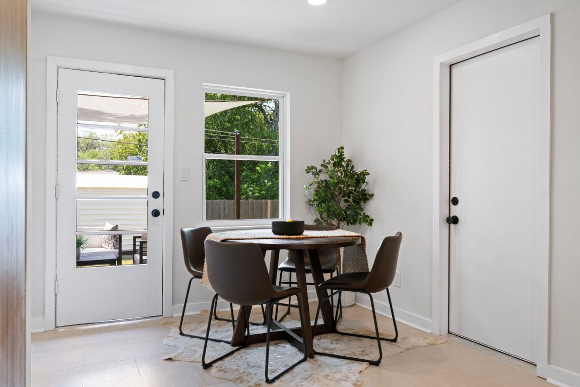 1609 Chatham Avenue Austin, TX 78723 - Photo 18 of 31 a view of a dining room with furniture and window