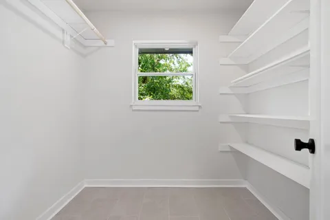 a view of an empty walk in closet