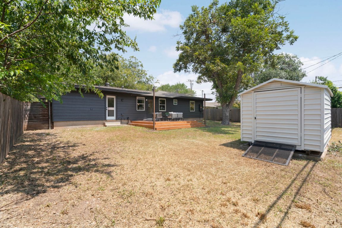 1609 Chatham Avenue Austin, TX 78723 - Photo 30 of 31 a view of a house with a yard and large tree