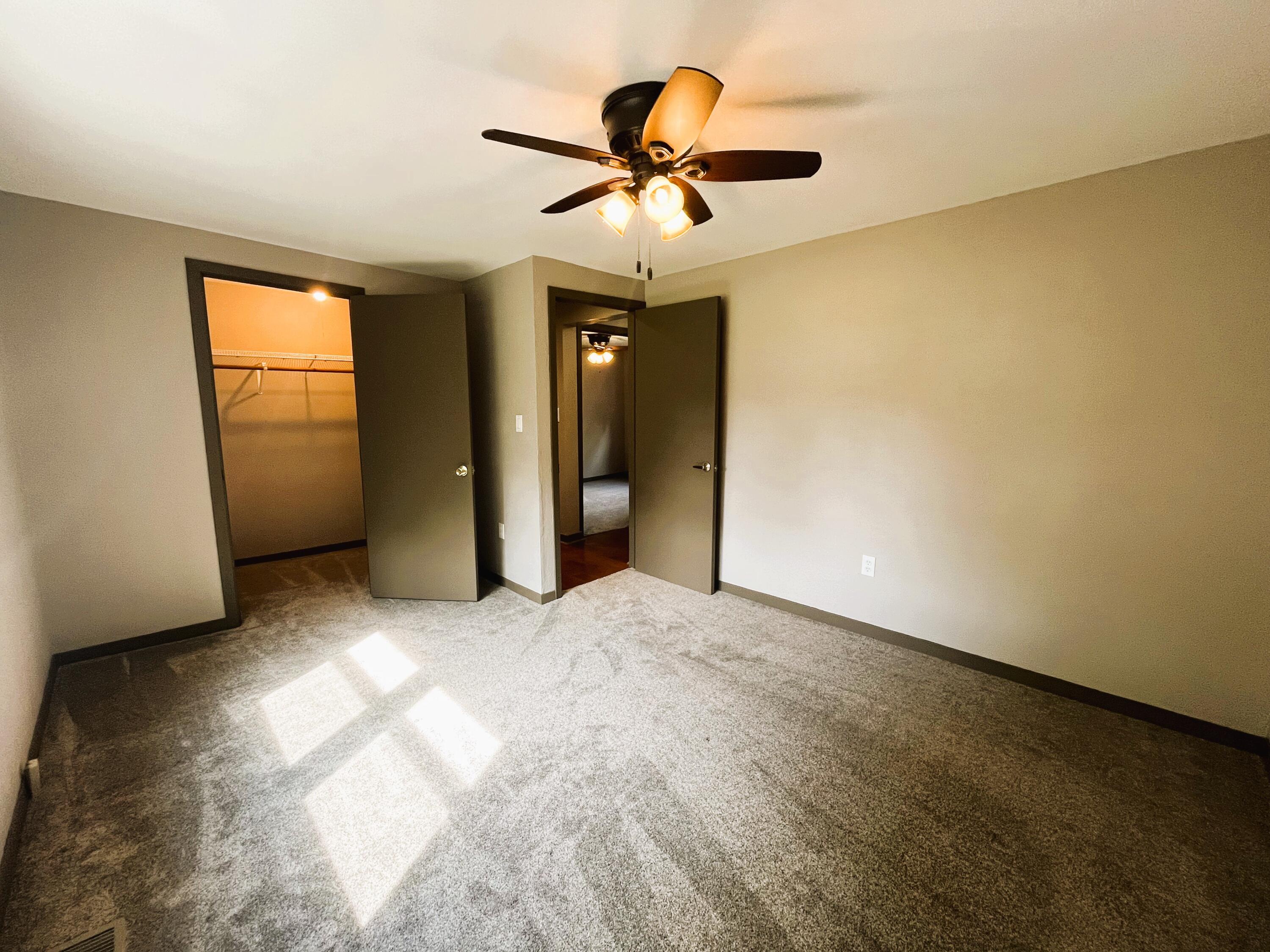 821 East Merritt Street Rensselaer, IN 47978 - Photo 15 of 18 wooden floor in an empty room with a window