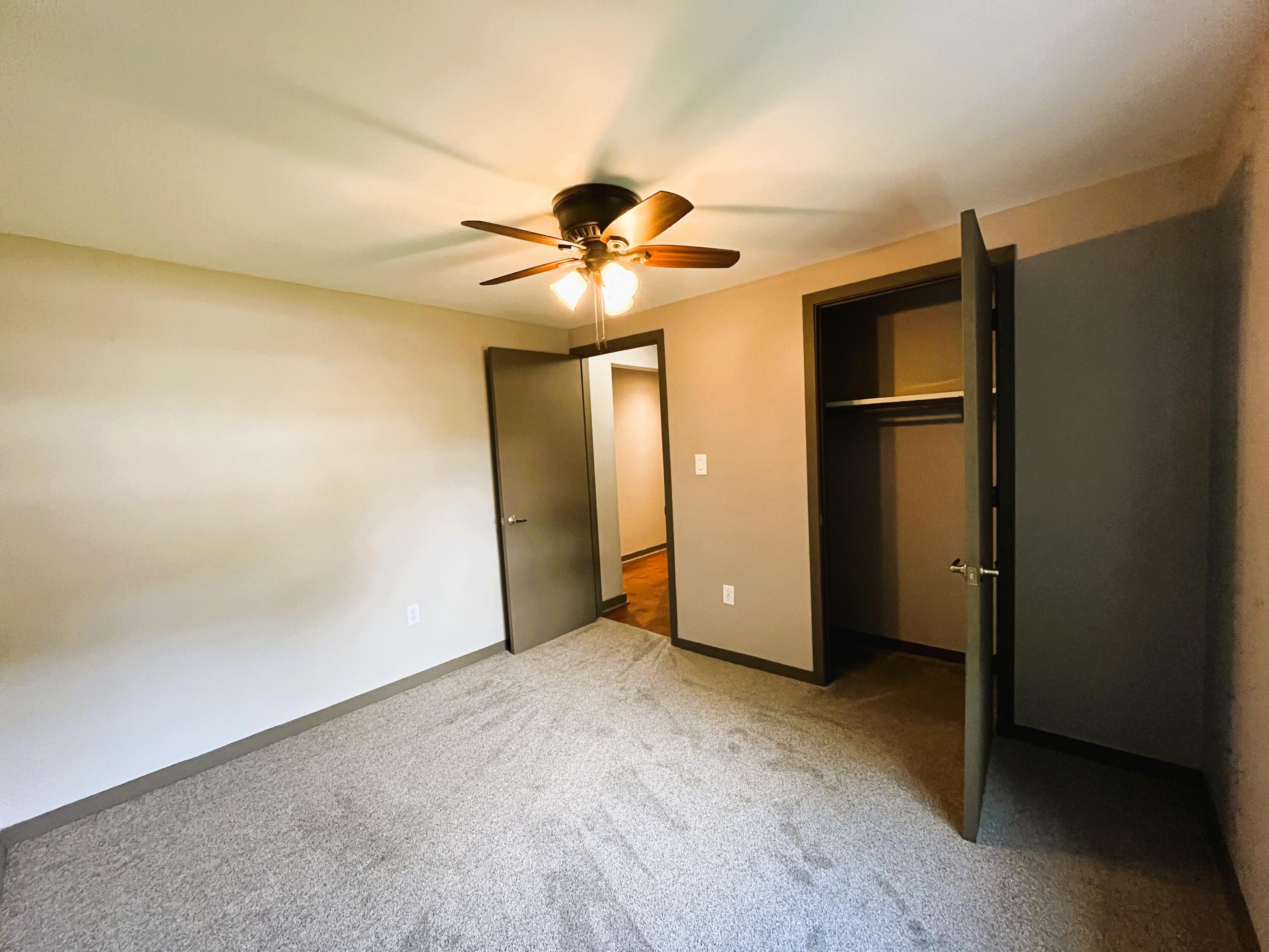 821 East Merritt Street Rensselaer, IN 47978 - Photo 18 of 18 a view of an empty room with a ceiling fan