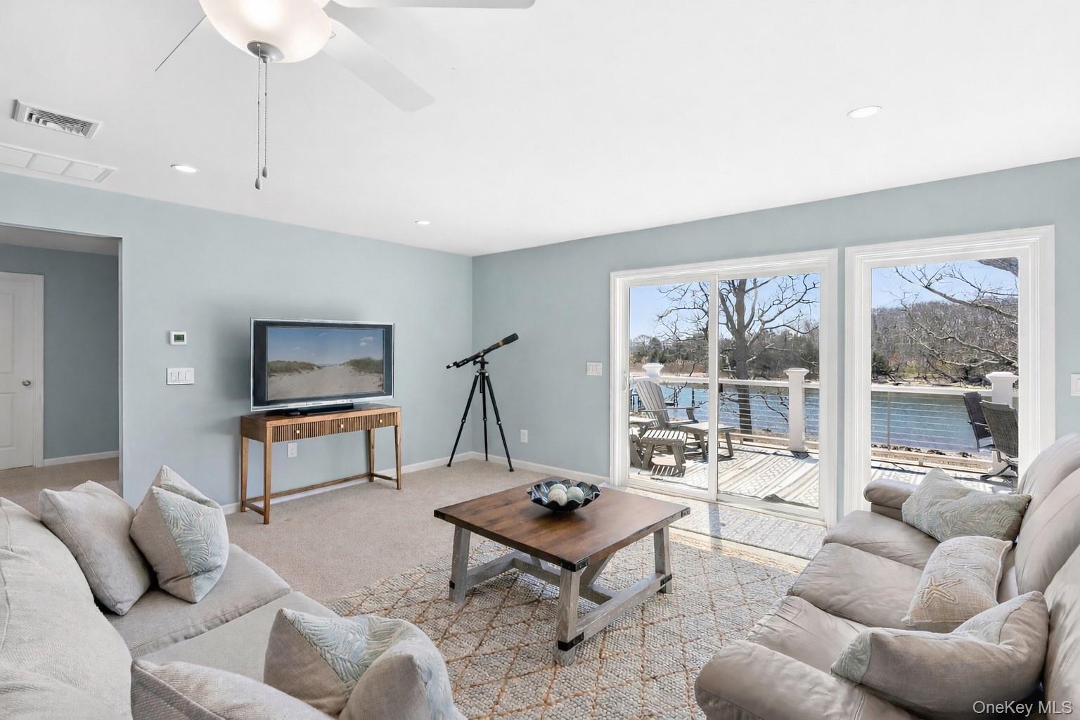 2280 Deep Hole Drive Mattituck, NY 11952 - Photo 12 of 35 Comfortable gathering space ideal for entertaining after a day on the water