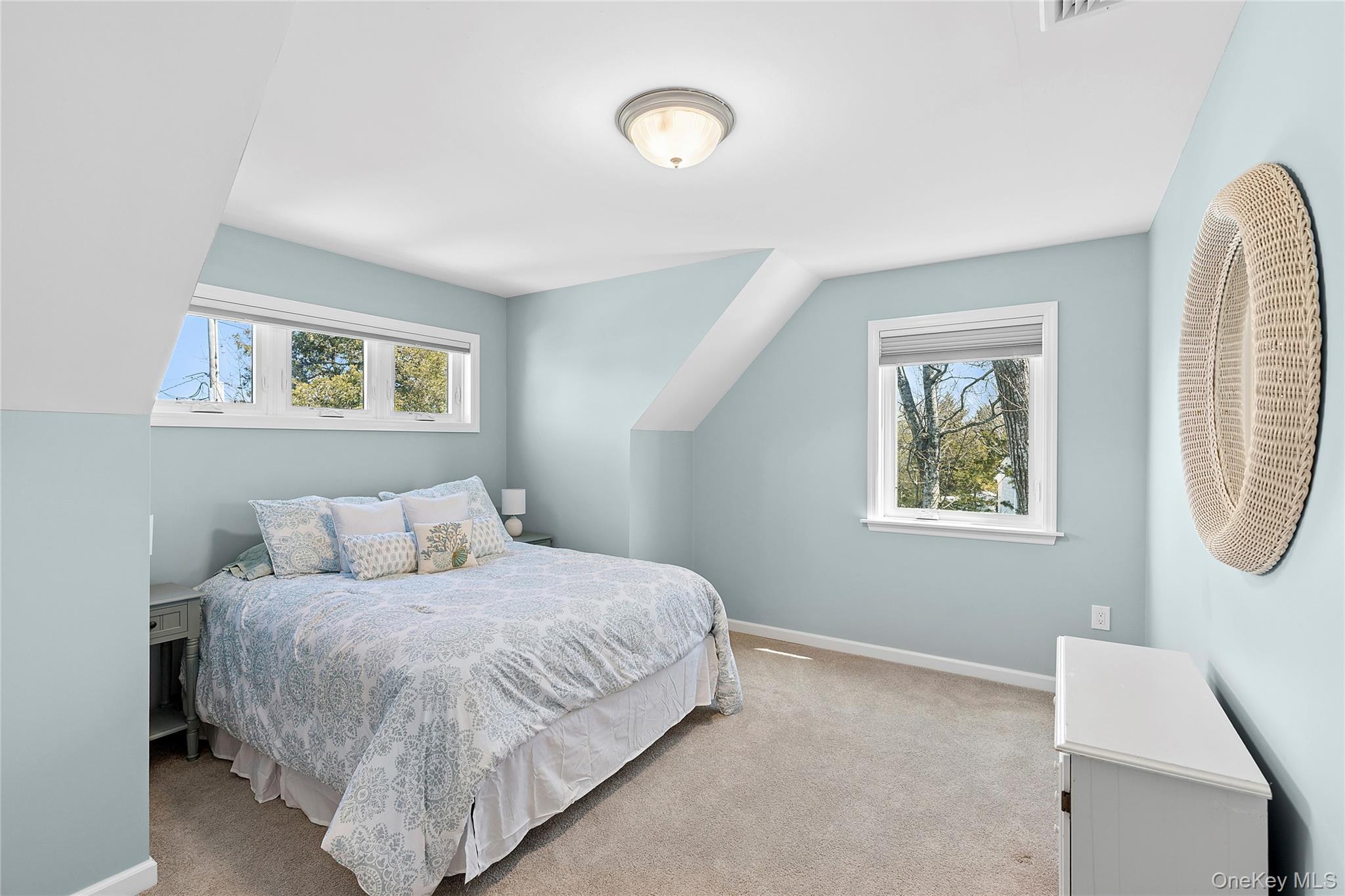 2280 Deep Hole Drive Mattituck, NY 11952 - Photo 15 of 35 Guest bedroom with plenty of windows and natural light