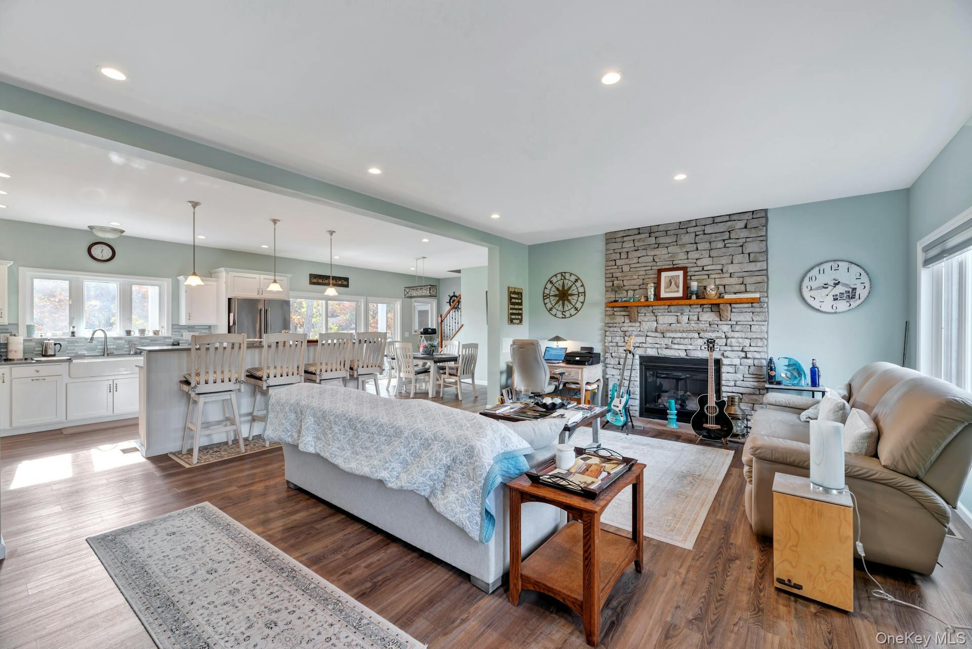 2280 Deep Hole Drive Mattituck, NY 11952 - Photo 17 of 41 a living room with furniture and a fireplace
