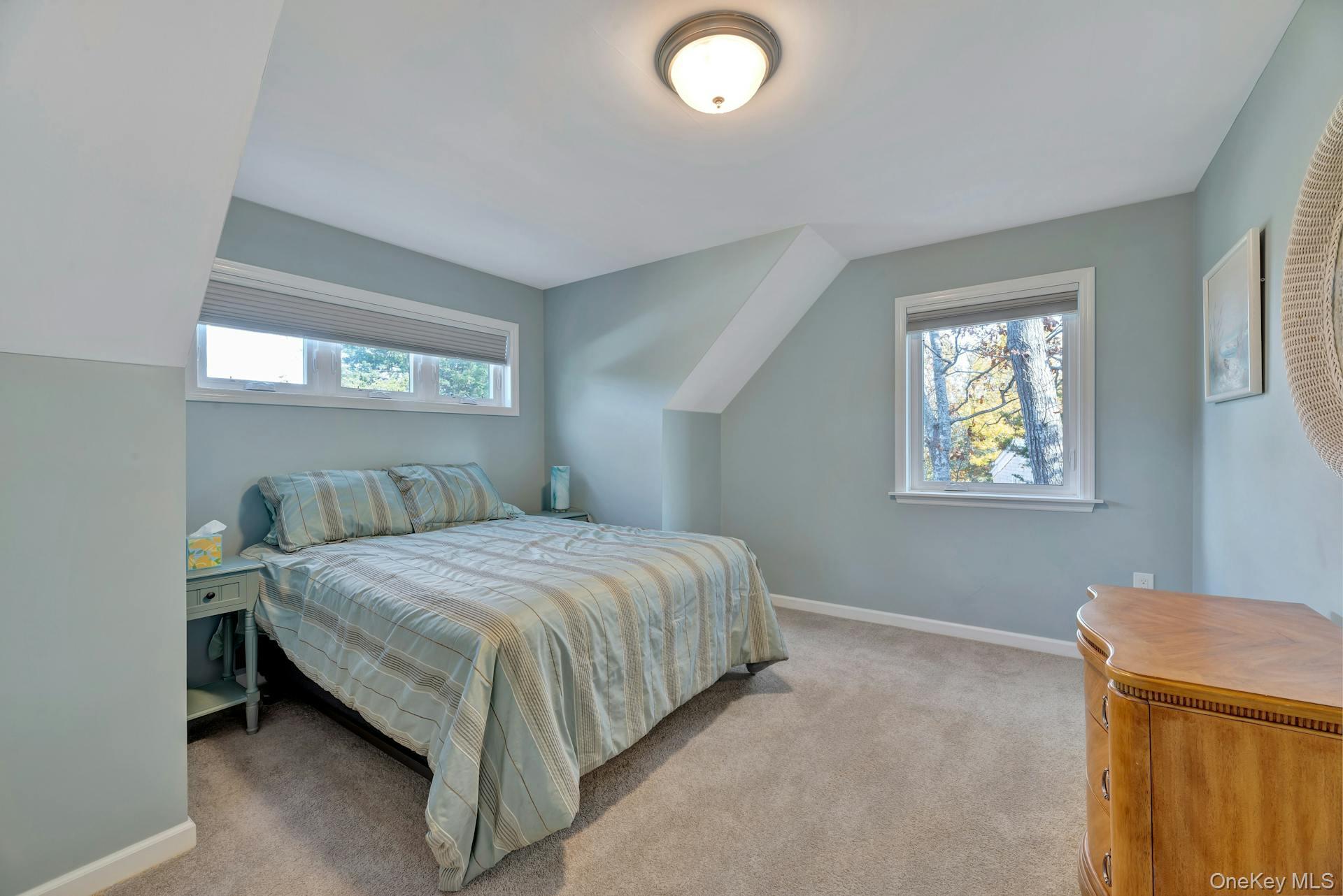 2280 Deep Hole Drive Mattituck, NY 11952 - Photo 23 of 45 Guest bedroom designed with privacy and natural light