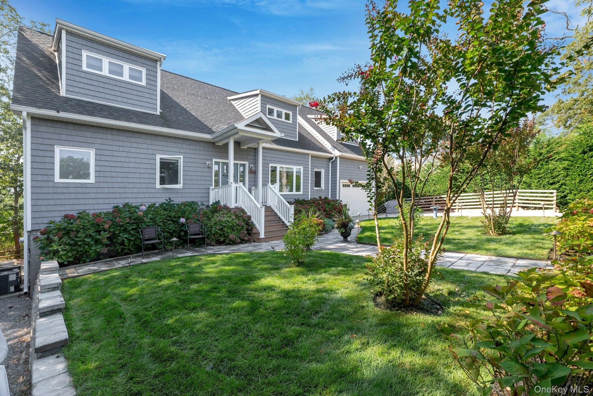 2280 Deep Hole Drive Mattituck, NY 11952 - Photo 32 of 41 a house view with a garden space