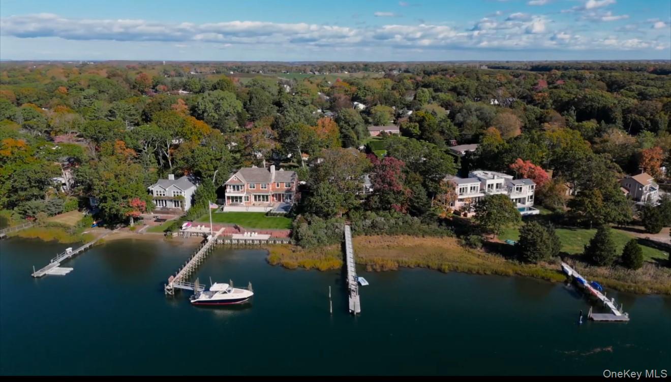 2280 Deep Hole Drive Mattituck, NY 11952 - Photo 38 of 45 Aerial view of stellar waterfront home and dock
