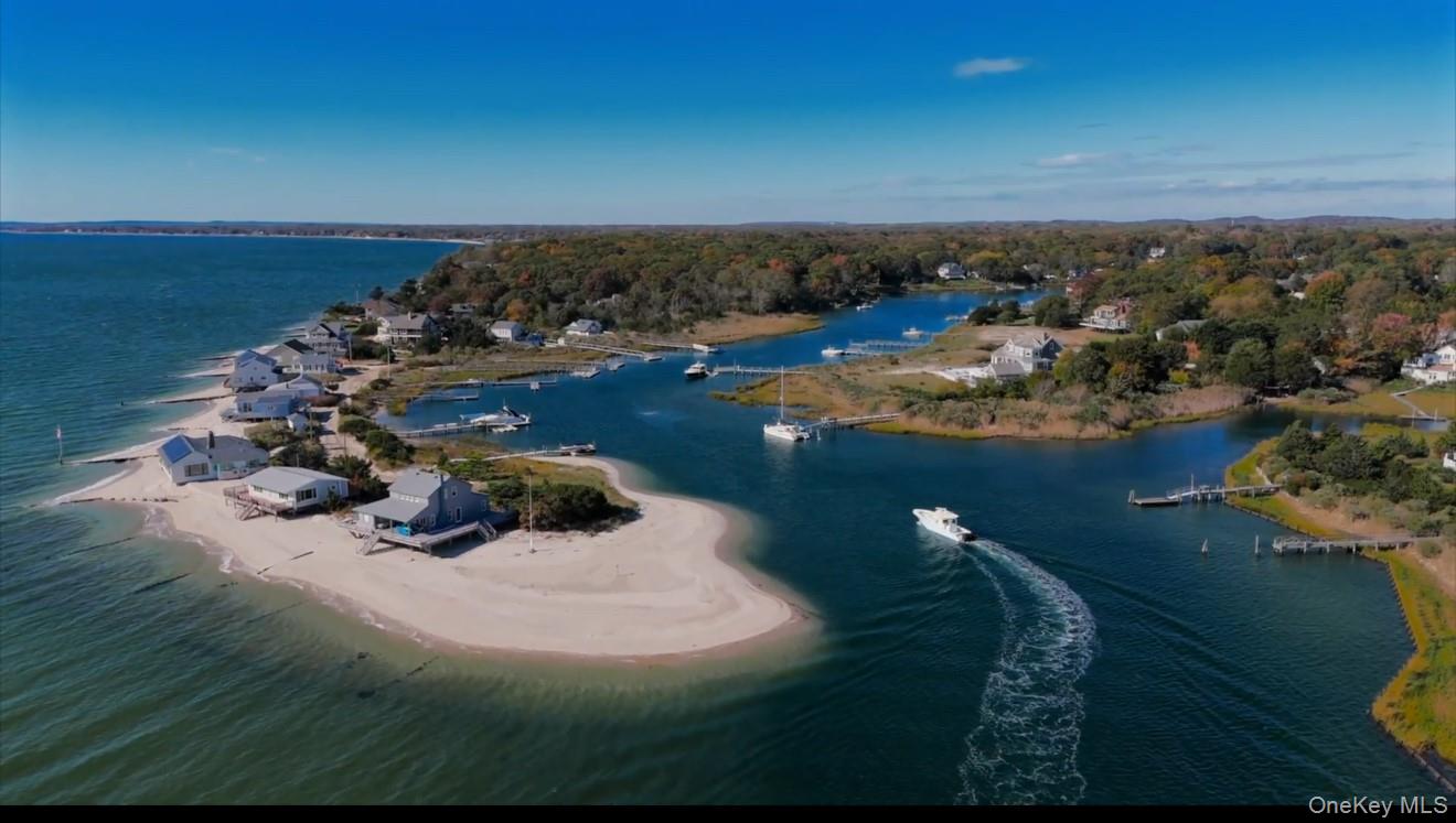 2280 Deep Hole Drive Mattituck, NY 11952 - Photo 40 of 41 an aerial view of a house with a yard