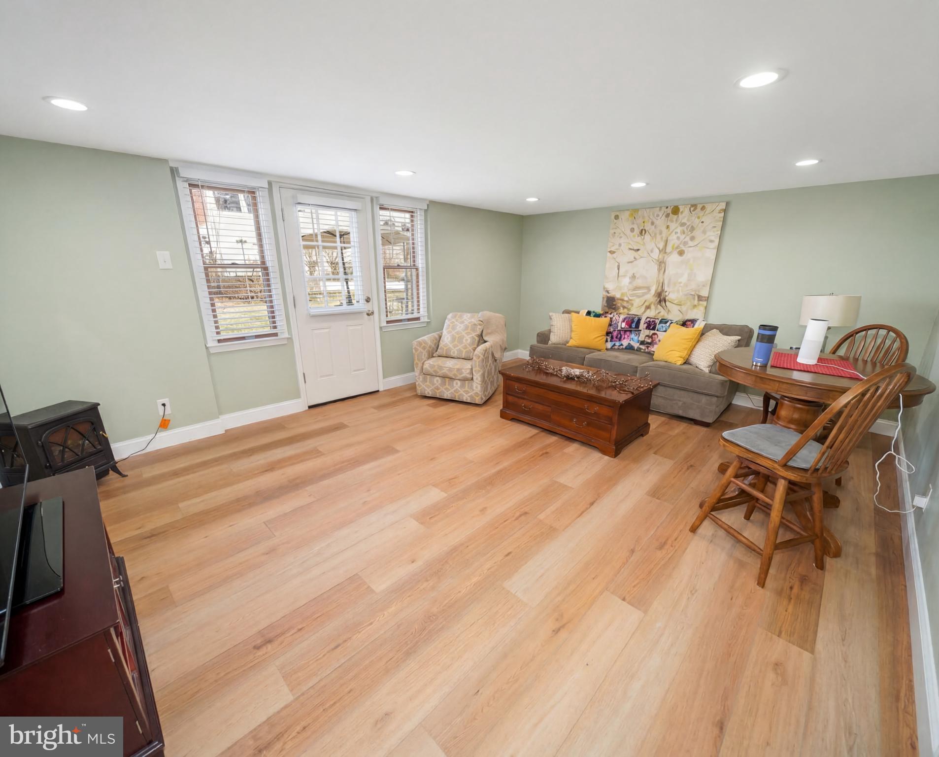 3216 Chesterfield Road Philadelphia, PA 19114 - Photo 24 of 27 a bedroom with a bed and wooden floor