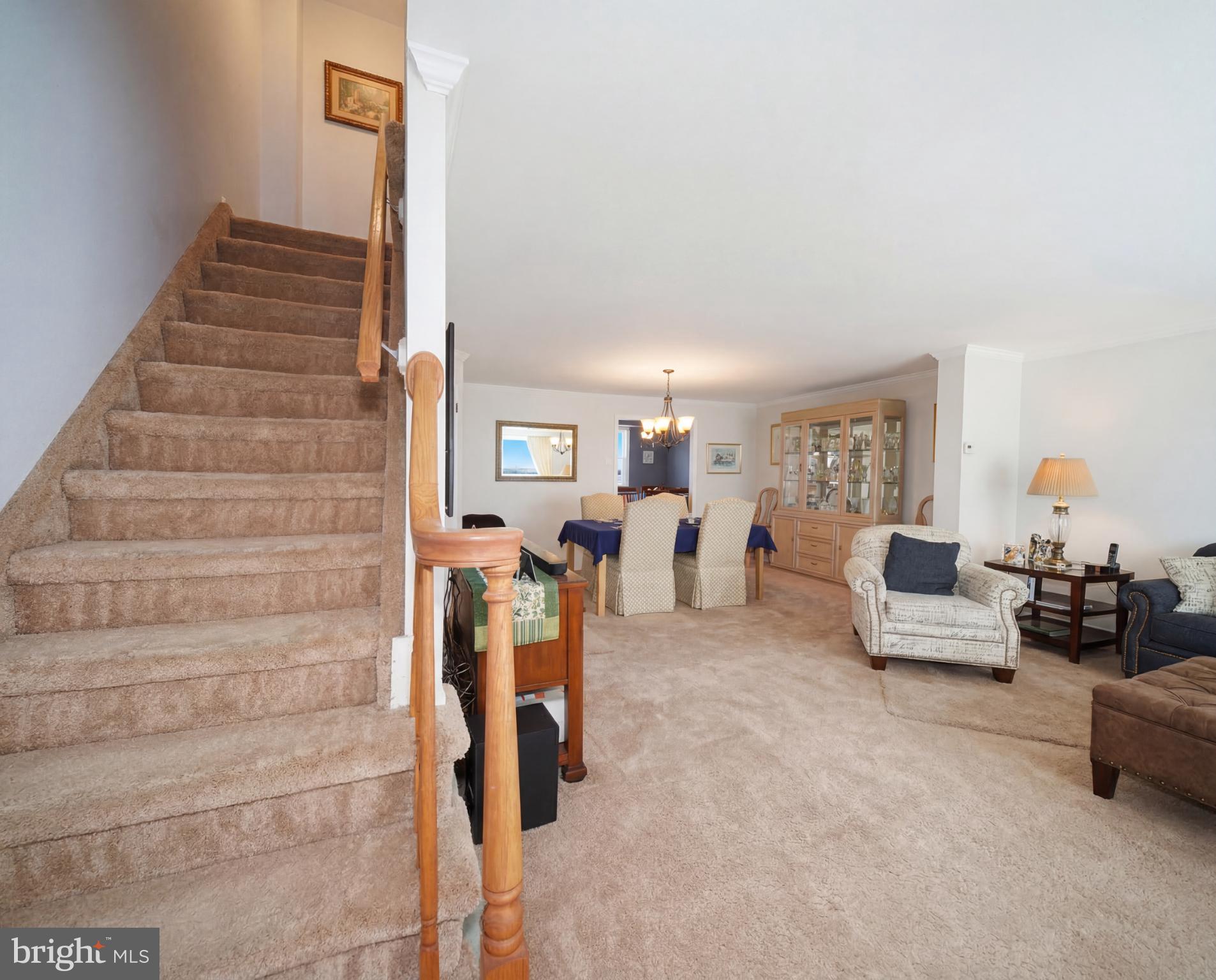 3216 Chesterfield Road Philadelphia, PA 19114 - Photo 3 of 27 a living room with furniture and a chandelier