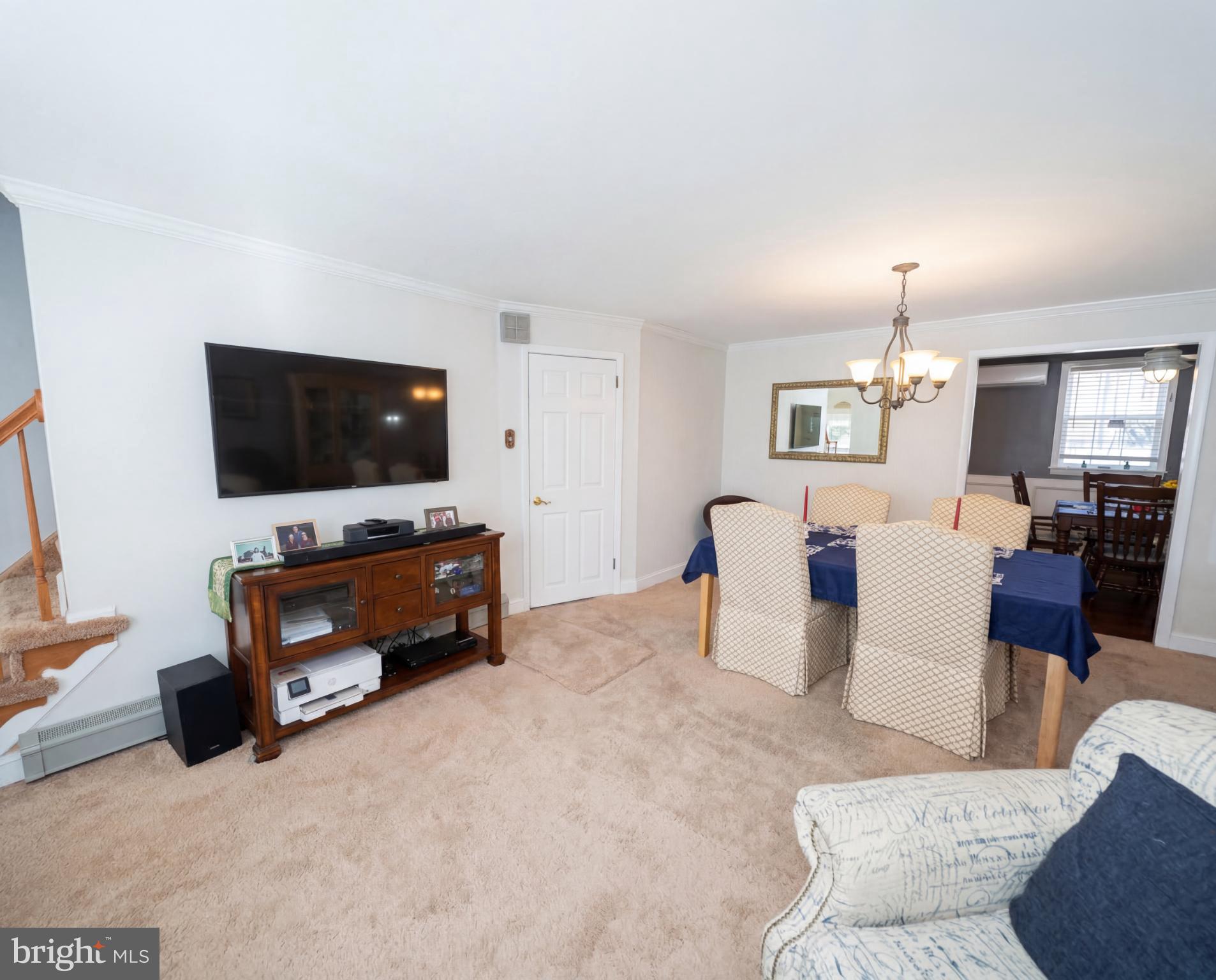 3216 Chesterfield Road Philadelphia, PA 19114 - Photo 5 of 27 a living room with furniture and a flat screen tv