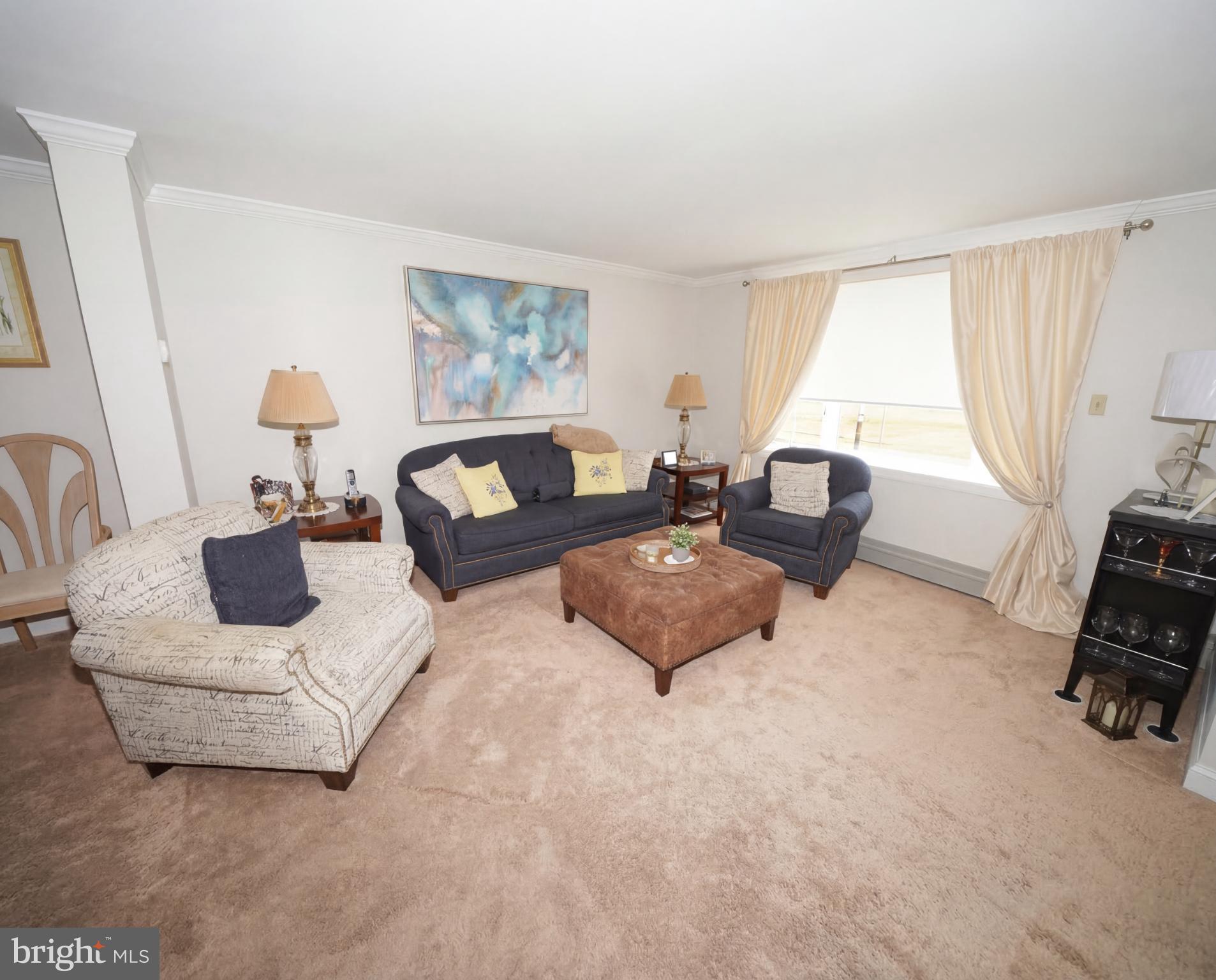 3216 Chesterfield Road Philadelphia, PA 19114 - Photo 6 of 27 a living room with furniture and a window