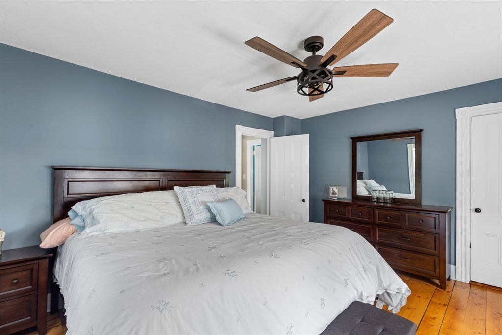 1012 Washington Street Whitman, MA 02382 - Photo 17 of 37 a bedroom with a bed and window