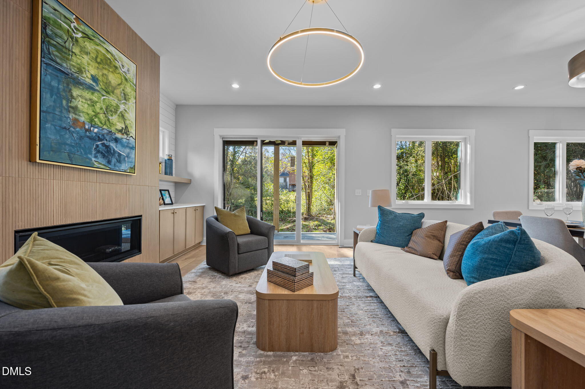 1005 Phoenix Place Raleigh, NC 27610 - Photo 12 of 38 a living room with furniture and a large window