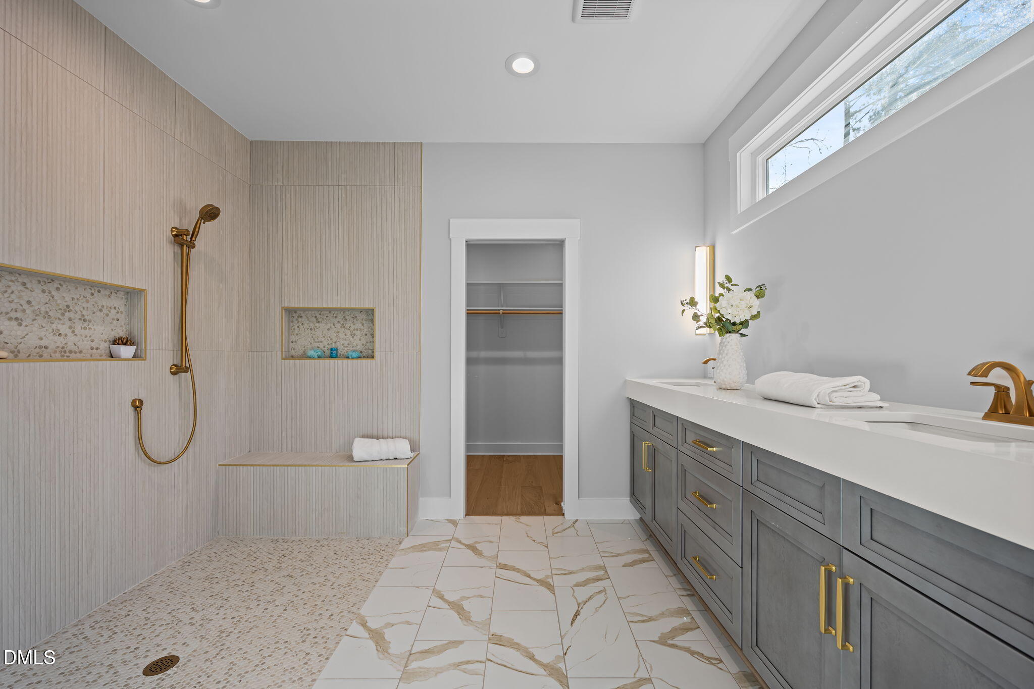 1005 Phoenix Place Raleigh, NC 27610 - Photo 17 of 38 a bathroom with a granite countertop sink a toilet and shower