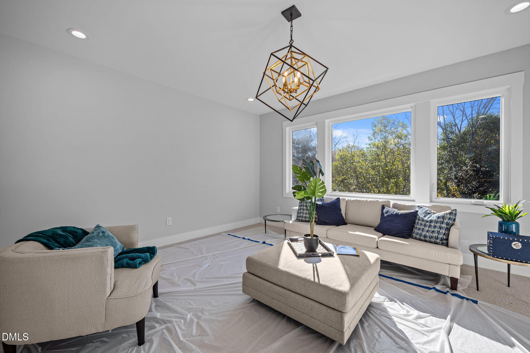 1005 Phoenix Place Raleigh, NC 27610 - Photo 27 of 38 a view of a livingroom with furniture and window