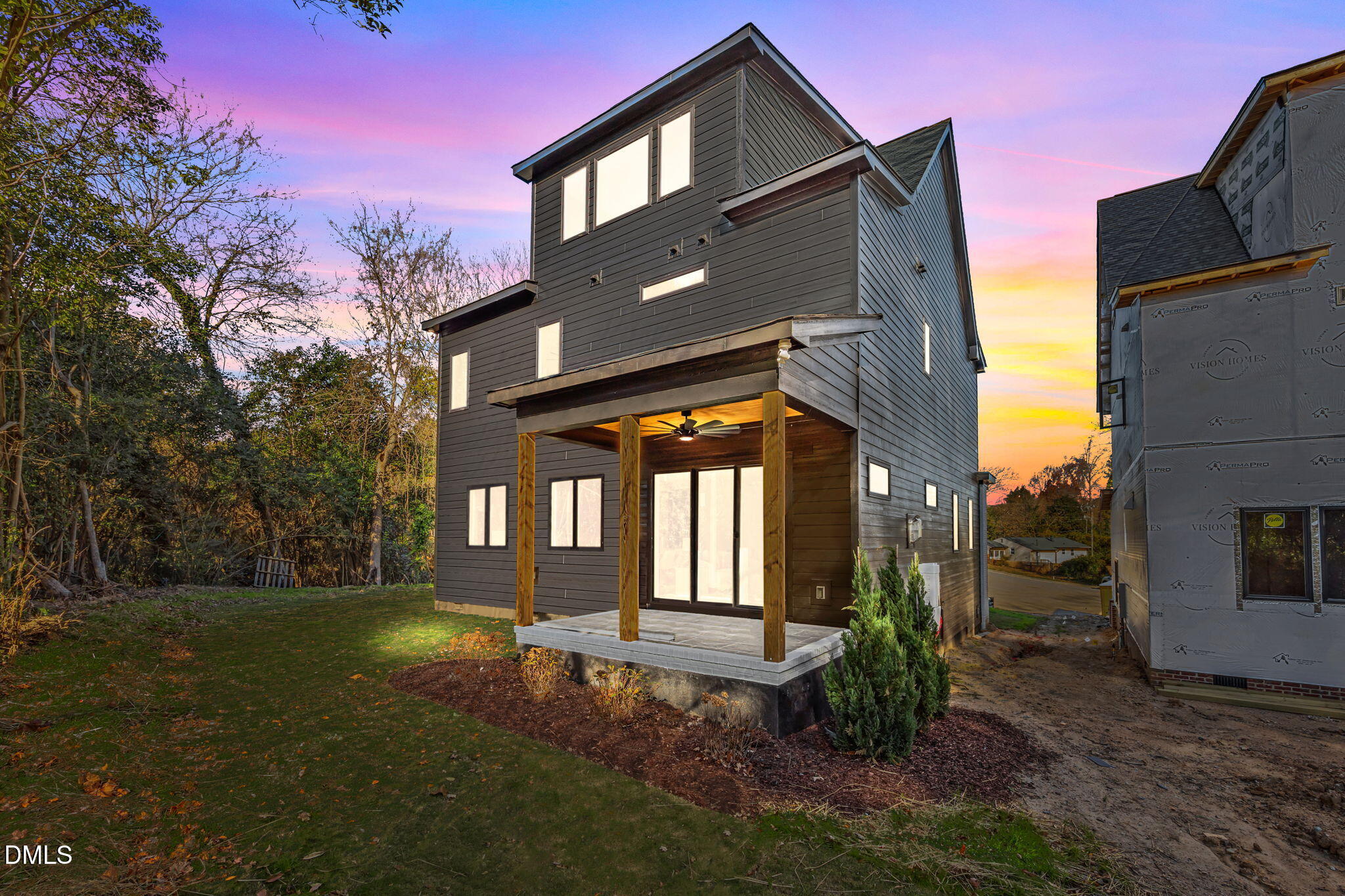 1005 Phoenix Place Raleigh, NC 27610 - Photo 34 of 38 a front view of a house with a yard
