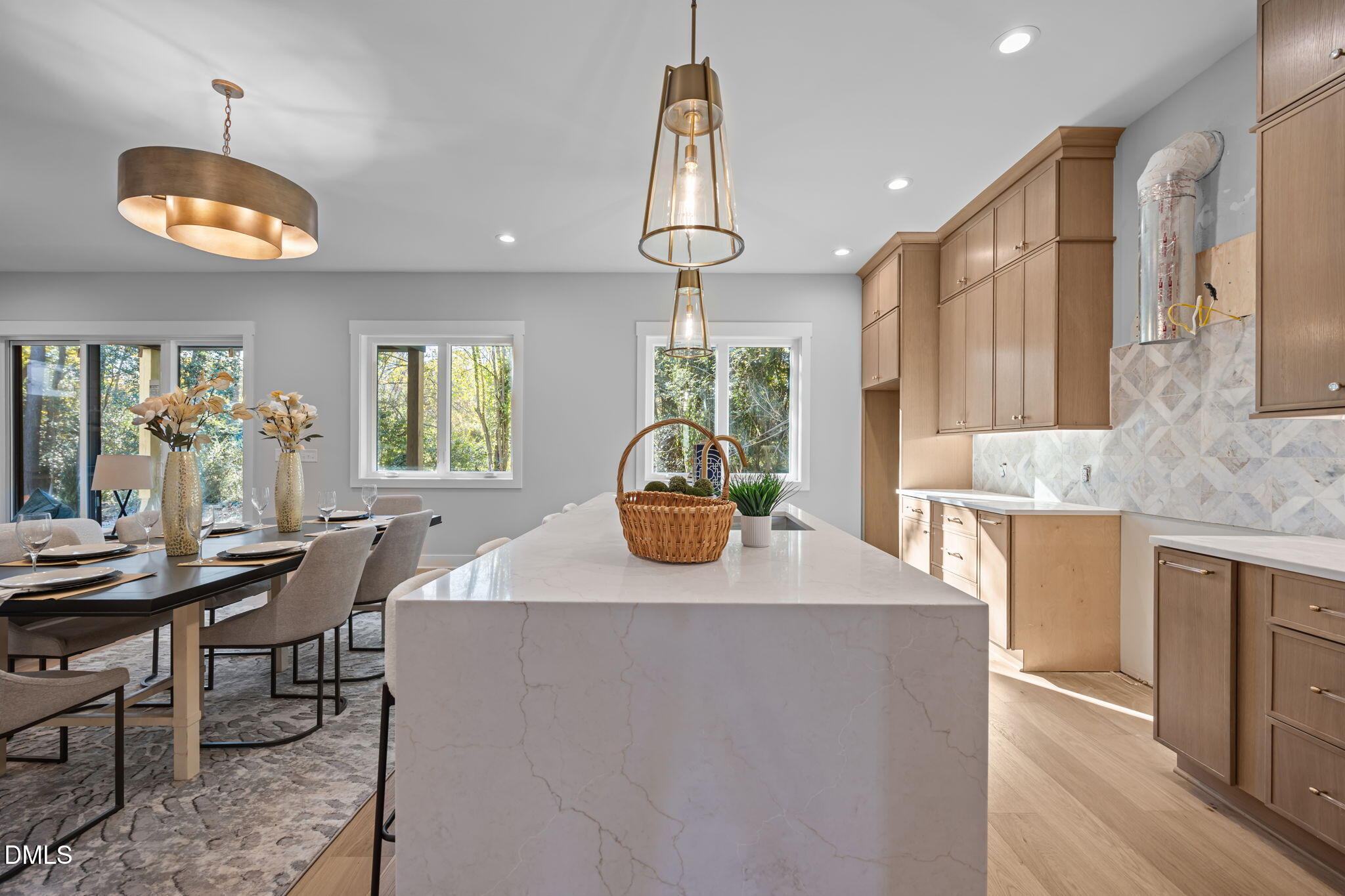 1005 Phoenix Place Raleigh, NC 27610 - Photo 6 of 38 a kitchen with stainless steel appliances granite countertop a sink a stove and a wooden floors