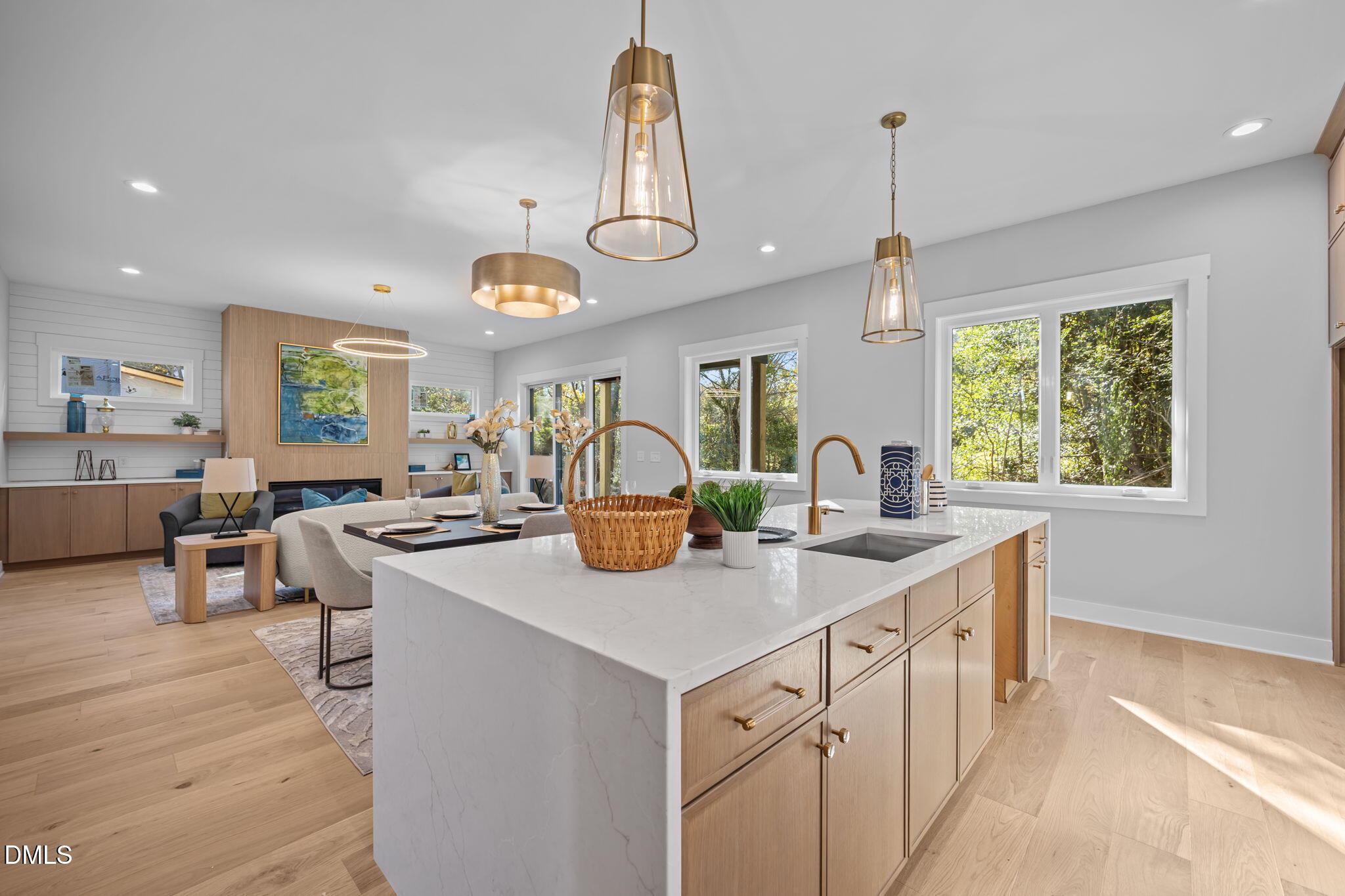 1005 Phoenix Place Raleigh, NC 27610 - Photo 10 of 38 a kitchen with a stove a counter space a sink and a wooden floors
