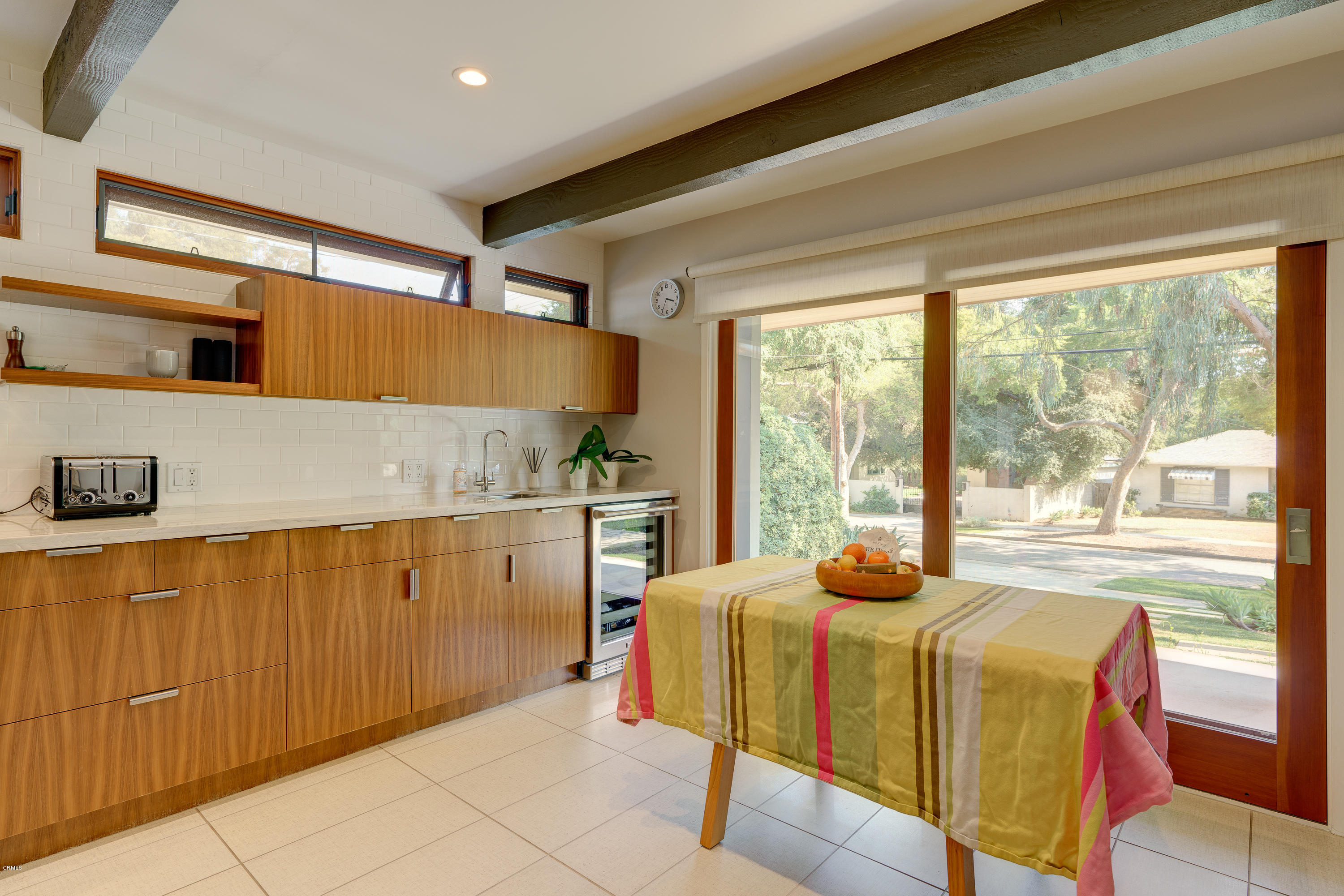 1025 Nithsdale Road Pasadena, CA 91105 - Photo 11 of 34 a bedroom with a bed and large windows