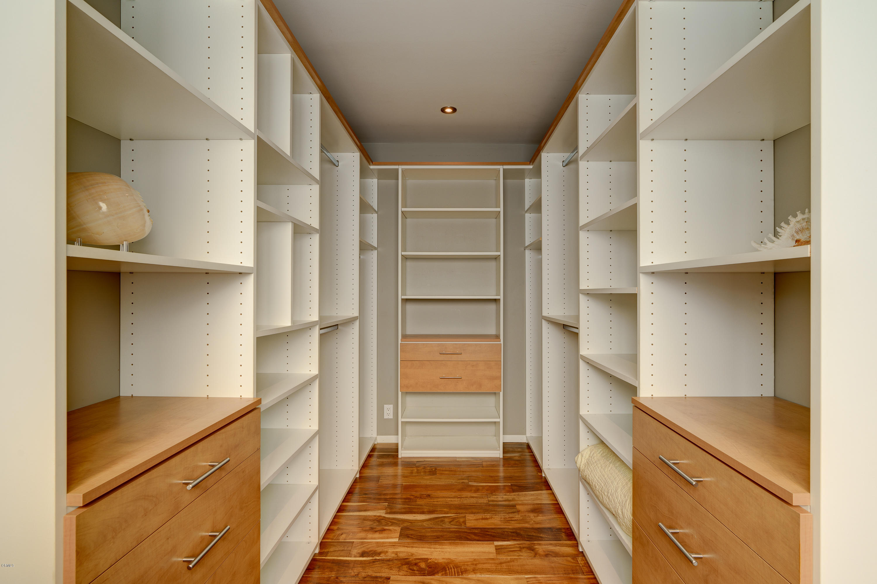 1025 Nithsdale Road Pasadena, CA 91105 - Photo 19 of 34 a hallway with cabinets and wooden floor