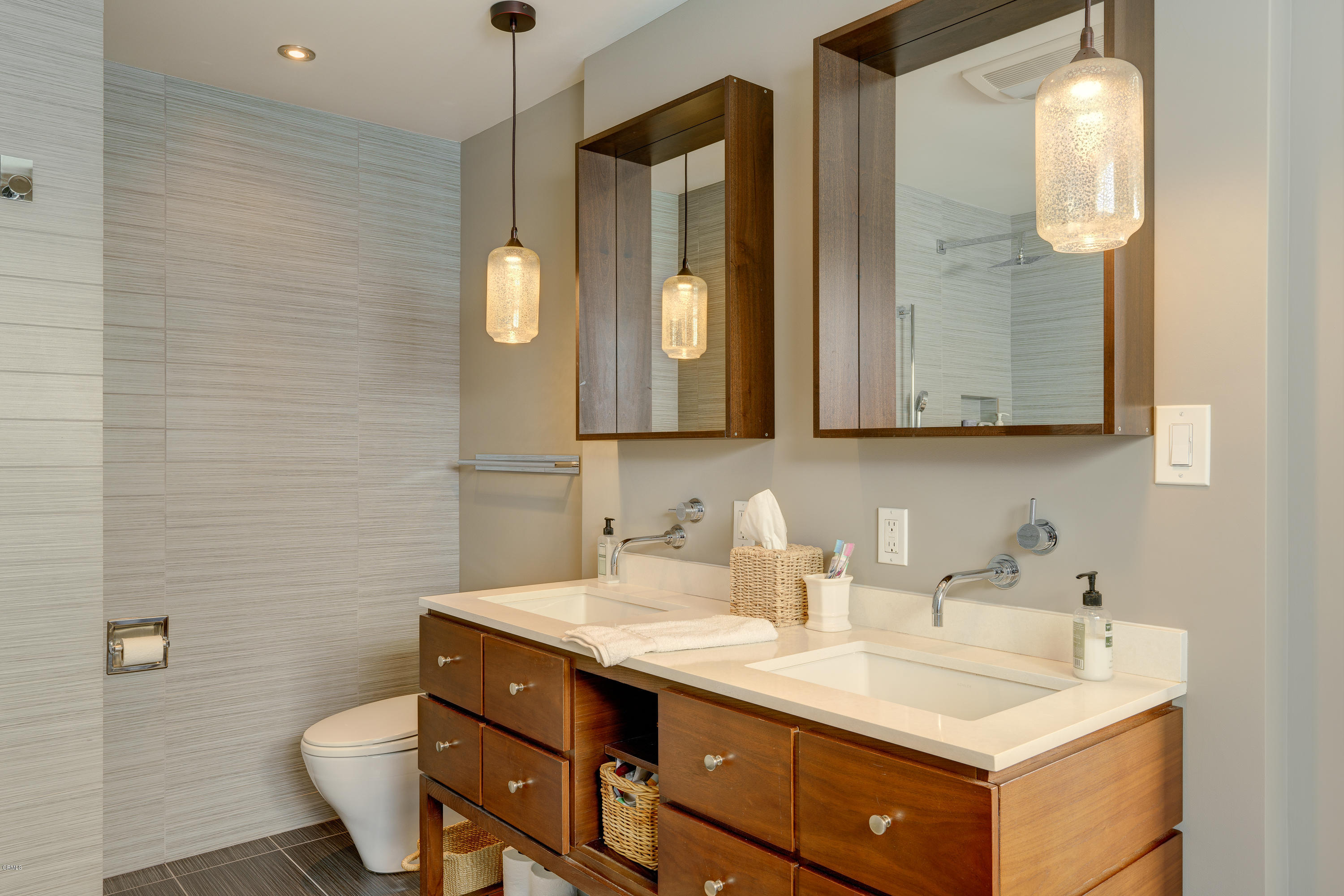 1025 Nithsdale Road Pasadena, CA 91105 - Photo 20 of 34 a bathroom with a sink and a mirror