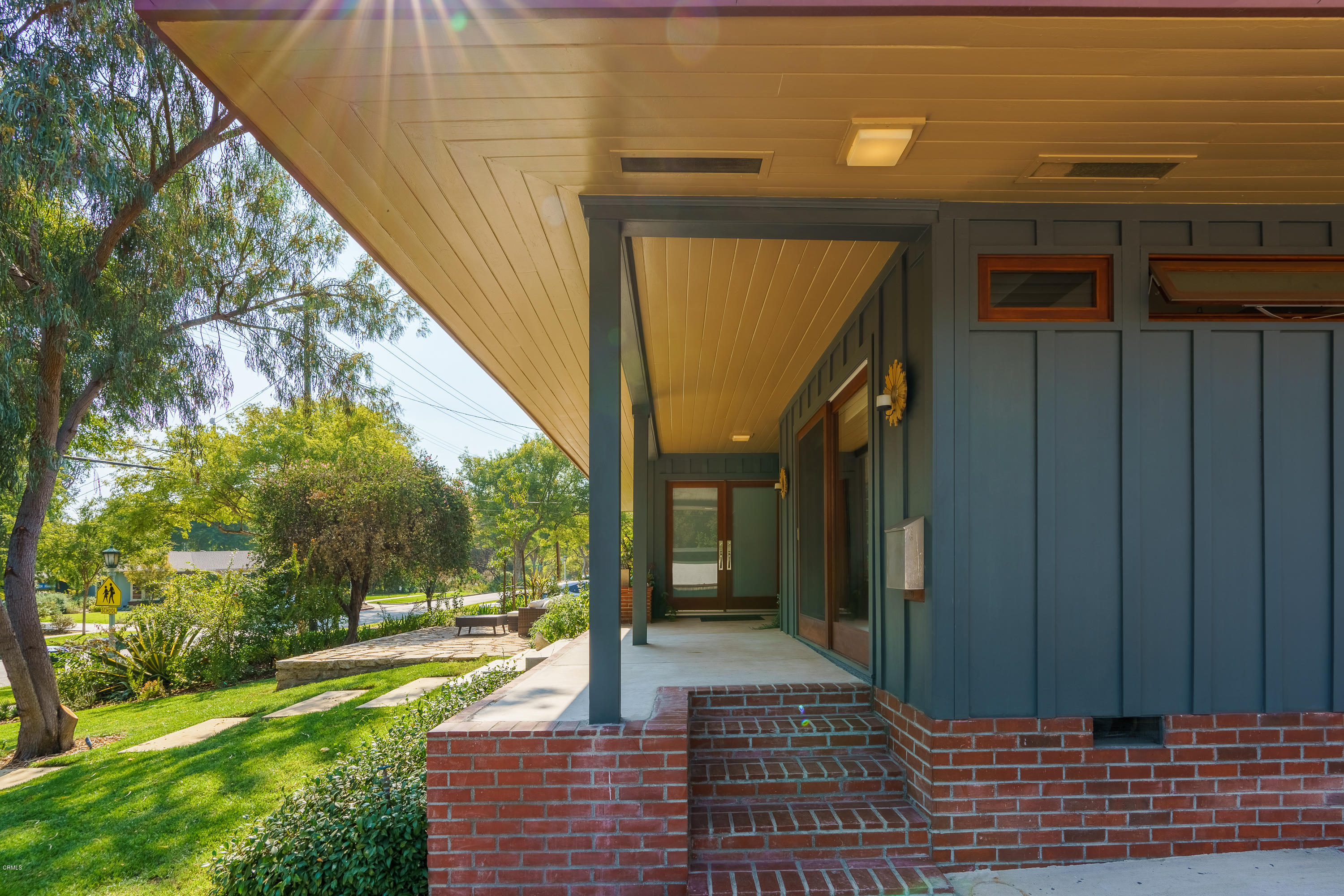 1025 Nithsdale Road Pasadena, CA 91105 - Photo 3 of 34 a view of a balcony with wooden floor and fence