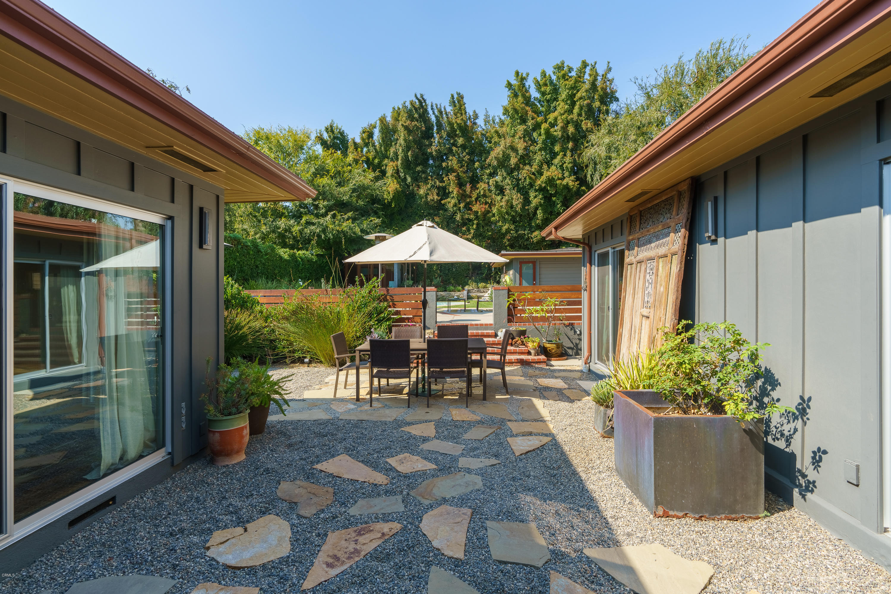 1025 Nithsdale Road Pasadena, CA 91105 - Photo 25 of 34 a view of a house with backyard and sitting area
